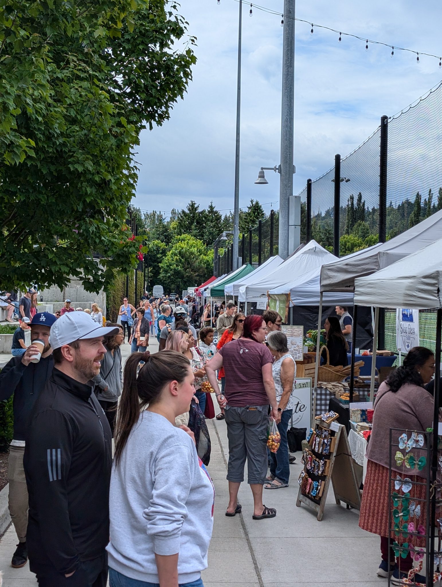 A bustling day at Woodinville Farmers Market, a community staple since 1993.
